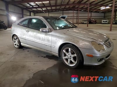 Czwarte zdjęcie samochodu z boku: 2003 MERCEDES-BENZ C 230K SPORT COUPE VIN:WDBRN40JX5A691336 - miniatura