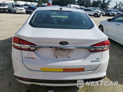 Zdjęcie 6 z 12 samochodu: 2018 FORD FUSION SE HYBRID VIN:3FA6P0LUXJR129892 - miniatura