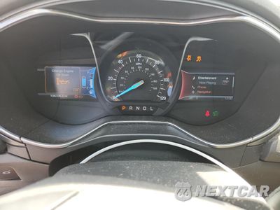 Zdjęcie 9 z 14 samochodu: 2014 FORD FUSION TITANIUM PHEV VIN:3FA6P0SU3ER216962 - miniatura