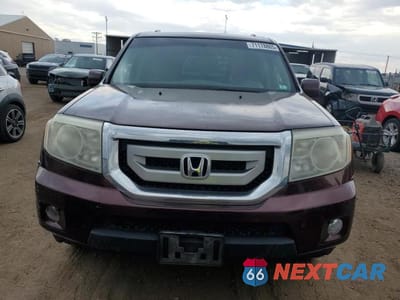 Piąte zdjęcie samochodu w środku: 2011 HONDA PILOT EXL VIN:5FNYF4H57BB080085 - miniatura