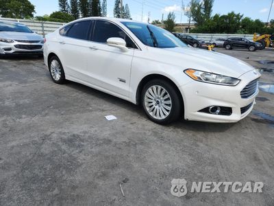 Czwarte zdjęcie samochodu z boku: 2014 FORD FUSION TITANIUM PHEV VIN:3FA6P0SU3ER216962 - miniatura