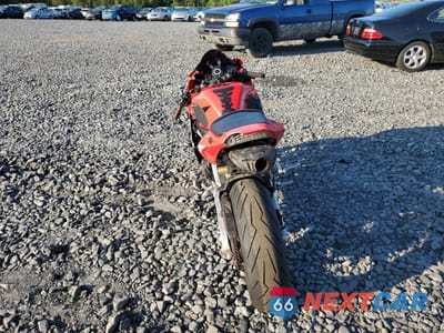 Czwarte zdjęcie samochodu z boku: 2005 HONDA CBR600 RR VIN:JH2PC37015M208943 - miniatura