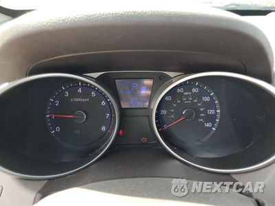 Zdjęcie 9 z 13 samochodu: 2015 HYUNDAI TUCSON LIMITED VIN:KM8JUCAGXFU101906 - miniatura