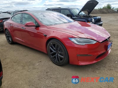 Czwarte zdjęcie samochodu z boku: 2021 TESLA MODEL S VIN:5YJSA1E60MF449291 - miniatura