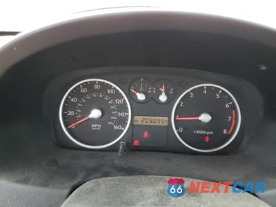 Zdjęcie 9 z 12 samochodu: 2005 HYUNDAI TIBURON GT VIN:KMHHN65F25U160235 - miniatura