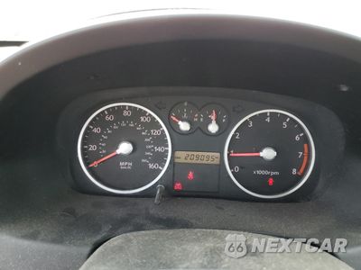 Zdjęcie 9 z 12 samochodu: 2005 HYUNDAI TIBURON GT VIN:KMHHN65F25U160235 - miniatura