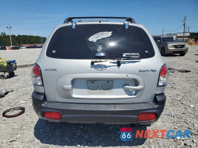 Zdjęcie 6 z 13 samochodu: 2001 HYUNDAI SANTA FE GLS VIN:KM8SC83D31U029432 - miniatura