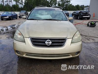 Piąte zdjęcie samochodu w środku: 2002 NISSAN ALTIMA BASE VIN:1N4AL11D32C108946 - miniatura