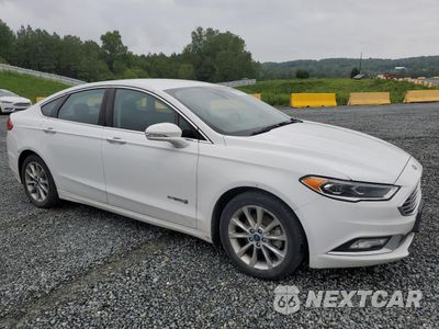 Czwarte zdjęcie samochodu z boku: 2017 FORD FUSION SE HYBRID VIN:3FA6P0LU3HR359543 - miniatura