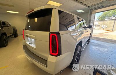Czwarte zdjęcie samochodu z boku: 2015 CHEVROLET TAHOE C1500 LTZ VIN:1GNSCCKC0FR123625 - miniatura