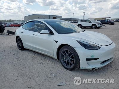Czwarte zdjęcie samochodu z boku: 2021 TESLA MODEL 3 VIN:5YJ3E1EAXMF920960 - miniatura