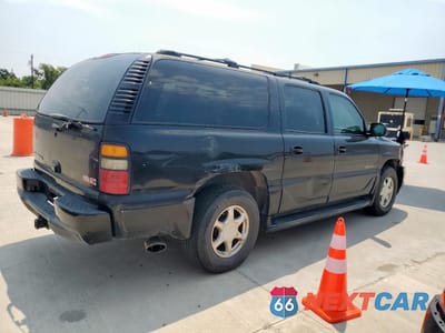 Trzecie zdjęcie samochodu z tyłu: 2004 GMC YUKON XL DENALI VIN:1GKFK66U14J266178 - miniatura