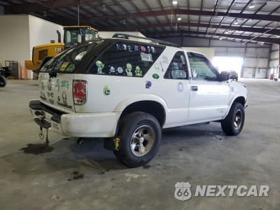 Trzecie zdjęcie samochodu z tyłu: 2003 CHEVROLET BLAZER VIN:1GNCS18X63K137572 - miniatura