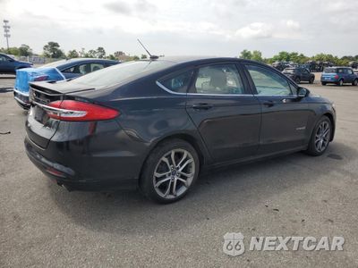 Trzecie zdjęcie samochodu z tyłu: 2017 FORD FUSION SE HYBRID VIN:3FA6P0LU0HR374596 - miniatura