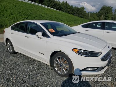 Czwarte zdjęcie samochodu z boku: 2017 FORD FUSION SE HYBRID VIN:3FA6P0LUXHR409676 - miniatura