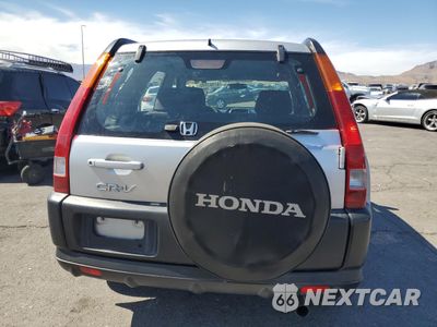 Zdjęcie 6 z 13 samochodu: 2004 HONDA CR-V LX VIN:JHLRD68464C015034 - miniatura