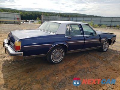 Trzecie zdjęcie samochodu z tyłu: 1985 OLDSMOBILE DELTA 88 ROYALE BROUGHAM VIN:1G3BY69Y2FY379333 - miniatura