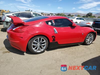 Trzecie zdjęcie samochodu z tyłu: 2014 NISSAN 370Z BASE VIN:JN1AZ4EH1EM636509 - miniatura