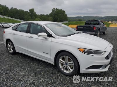 Czwarte zdjęcie samochodu z boku: 2018 FORD FUSION SE HYBRID VIN:3FA6P0LU8JR278687 - miniatura