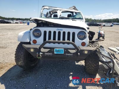 Piąte zdjęcie samochodu w środku: 2012 JEEP WRANGLER UNLIMITED SAHARA VIN:1C4BJWEG0CL143502 - miniatura