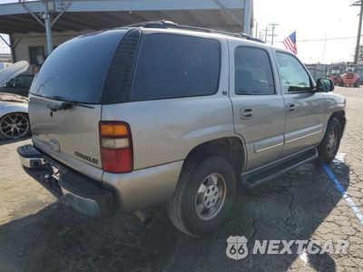 Trzecie zdjęcie samochodu z tyłu: 2001 CHEVROLET TAHOE C1500 VIN:1GNEC13T41R133700 - miniatura
