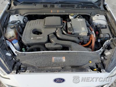 Zdjęcie 11 z 12 samochodu: 2018 FORD FUSION SE HYBRID VIN:3FA6P0LU5JR171726 - miniatura