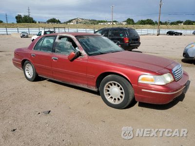 Czwarte zdjęcie samochodu z boku: 2000 FORD CROWN VICTORIA LX VIN:2FAFP74W4YX100974 - miniatura