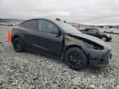 Czwarte zdjęcie samochodu z boku: 2023 TESLA MODEL Y VIN:7SAYGDEE3PF691274 - miniatura