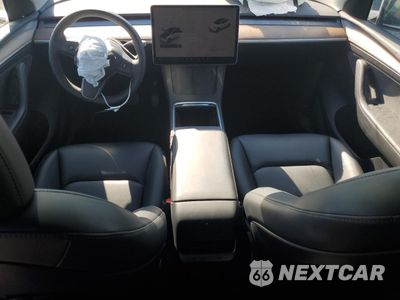 Zdjęcie 8 z 14 samochodu: 2023 TESLA MODEL Y VIN:7SAYGDEE0PA103666 - miniatura