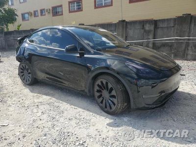 Czwarte zdjęcie samochodu z boku: 2022 TESLA MODEL Y VIN:7SAYGDEFXNF377238 - miniatura