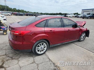 Trzecie zdjęcie samochodu z tyłu: 2017 FORD FOCUS SE VIN:1FADP3F27HL209260 - miniatura