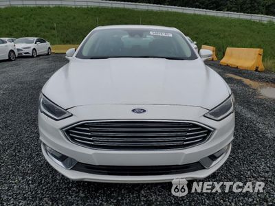 Piąte zdjęcie samochodu w środku: 2017 FORD FUSION SE HYBRID VIN:3FA6P0LU4HR410032 - miniatura