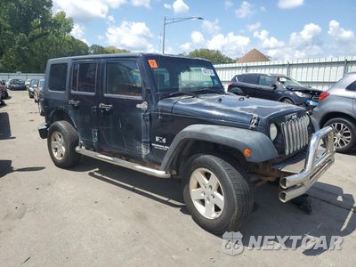Czwarte zdjęcie samochodu z boku: 2009 JEEP WRANGLER UNLIMITED X VIN:1J4GA39109L727363 - miniatura