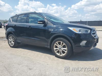 Czwarte zdjęcie samochodu z boku: 2018 FORD ESCAPE TITANIUM VIN:1FMCU9J92JUB33254 - miniatura