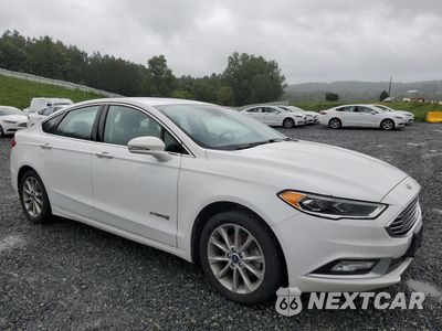 Czwarte zdjęcie samochodu z boku: 2017 FORD FUSION SE HYBRID VIN:3FA6P0LUXHR359538 - miniatura
