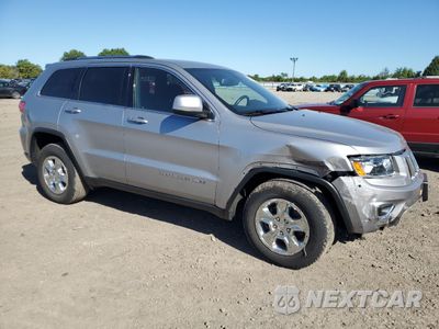 Czwarte zdjęcie samochodu z boku: 2015 JEEP GRAND CHEROKEE LAREDO VIN:1C4RJFAGXFC736518 - miniatura
