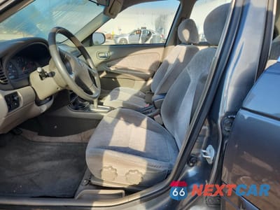 Zdjęcie 7 z 14 samochodu: 2001 NISSAN SENTRA XE VIN:3N1CB51D01L442497 - miniatura