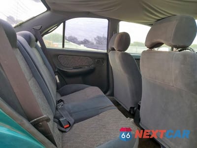 Zdjęcie 10 z 12 samochodu: 1999 NISSAN SENTRA BASE VIN:1N4AB41D4XC717507 - miniatura