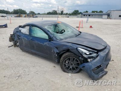 Czwarte zdjęcie samochodu z boku: 2023 TESLA MODEL 3 VIN:5YJ3E1EA5PF674212 - miniatura