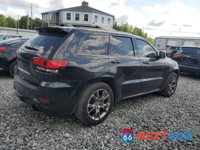 Trzecie zdjęcie samochodu z tyłu: 2015 JEEP GRAND CHEROKEE SRT-8 VIN:1C4RJFDJ0FC894583 - miniatura