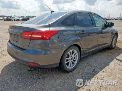 Trzecie zdjęcie samochodu z tyłu: 2018 FORD FOCUS SE VIN:1FADP3F28JL269506 - miniatura