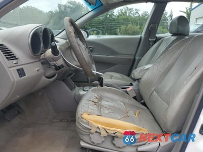 Zdjęcie 7 z 12 samochodu: 2003 NISSAN ALTIMA BASE VIN:1N4AL11D63C242836 - miniatura