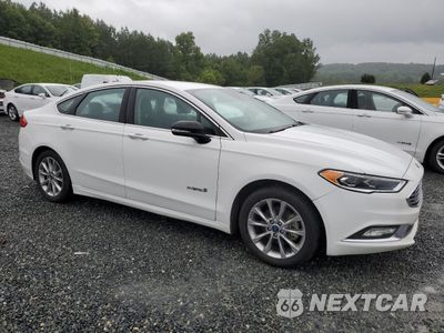 Czwarte zdjęcie samochodu z boku: 2017 FORD FUSION SE HYBRID VIN:3FA6P0LU9HR409216 - miniatura