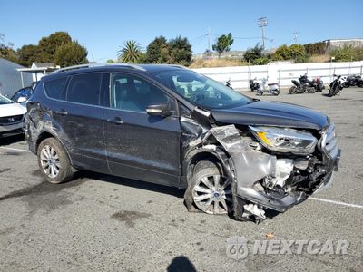 Czwarte zdjęcie samochodu z boku: 2018 FORD ESCAPE TITANIUM VIN:1FMCU0J97JUA42606 - miniatura