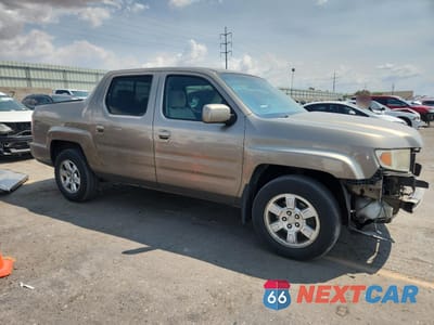 Czwarte zdjęcie samochodu z boku: 2010 HONDA RIDGELINE RTS VIN:5FPYK1F4XAB009800 - miniatura