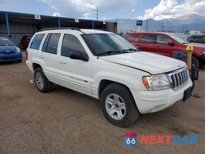 Czwarte zdjęcie samochodu z boku: 2004 JEEP GRAND CHEROKEE LIMITED VIN:1J4GX58S44C359864 - miniatura
