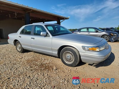 Czwarte zdjęcie samochodu z boku: 1997 MERCURY GRAND MARQUIS LS VIN:2MELM75W0VX669884 - miniatura
