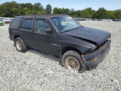 Czwarte zdjęcie samochodu z boku: 1996 HONDA PASSPORT EX VIN:4S6CK58V1T4413565 - miniatura