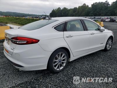 Trzecie zdjęcie samochodu z tyłu: 2017 FORD FUSION SE HYBRID VIN:3FA6P0LU2HR409218 - miniatura