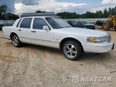 Czwarte zdjęcie samochodu z boku: 1996 LINCOLN TOWN CAR SIGNATURE VIN:1LNLM82W8TY720942 - miniatura